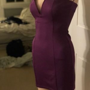 Purple strapless low cut bombshell dress